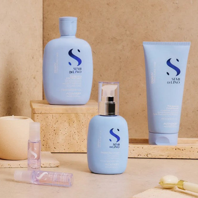 Haircare products with a brand logo on a beige background